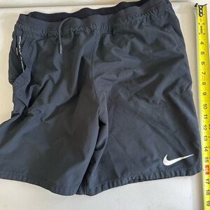 Nike Black Shorts with White Swoosh Logo
